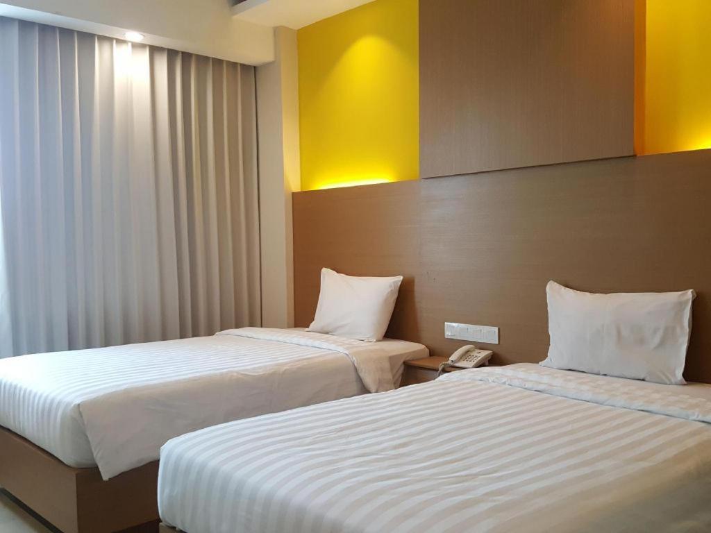 Kharisma Hotel มาดิอุน ภายนอก รูปภาพ
