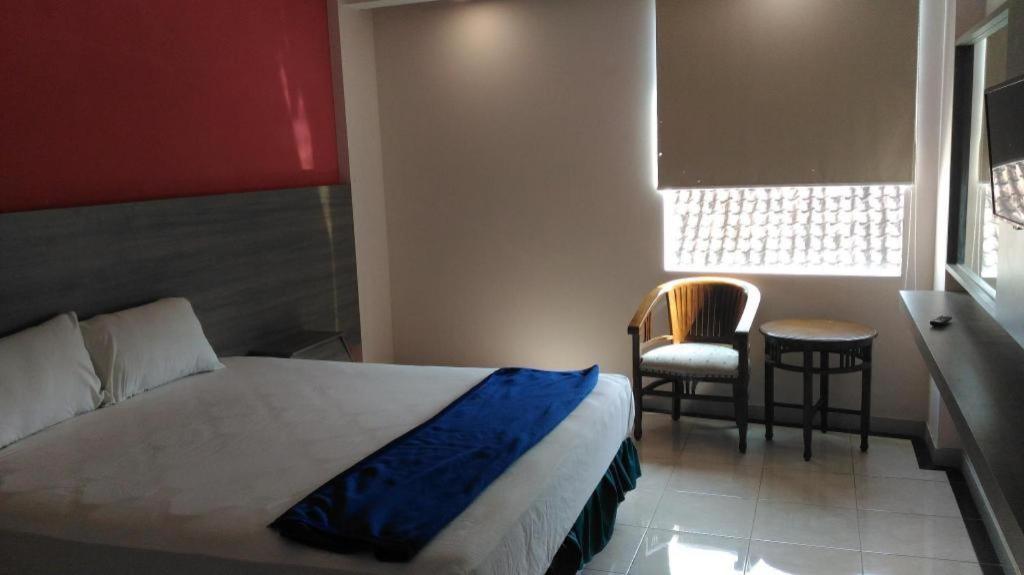 Kharisma Hotel มาดิอุน ภายนอก รูปภาพ