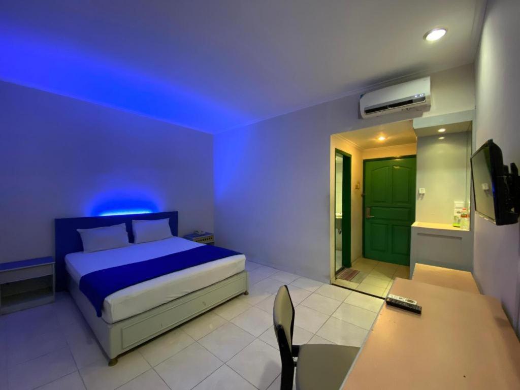 Kharisma Hotel มาดิอุน ภายนอก รูปภาพ