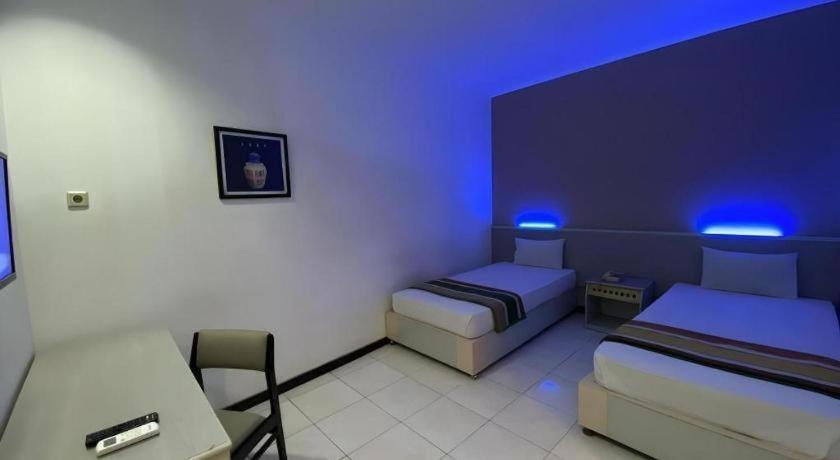 Kharisma Hotel มาดิอุน ภายนอก รูปภาพ